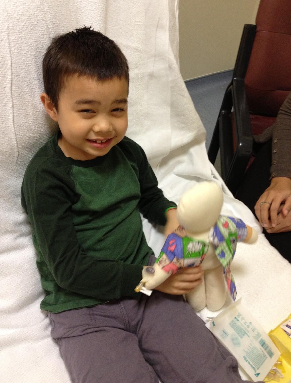 Ethan with medical doll